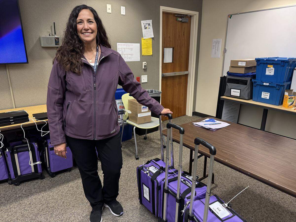 San Luis Obispo County clerk-recorder Elaina Cano unpacking e-pollbooks on Election Night, June 2, 2026.