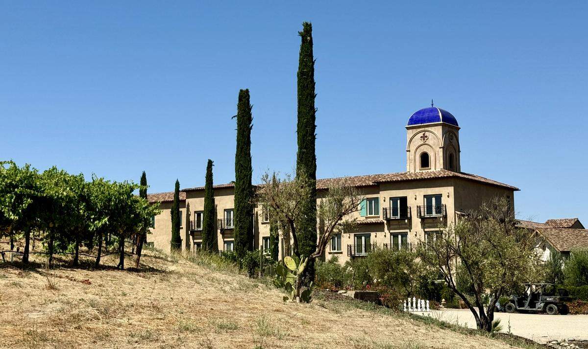 The rear of Allegretto Resort is seen in a view from a vineyard tour.