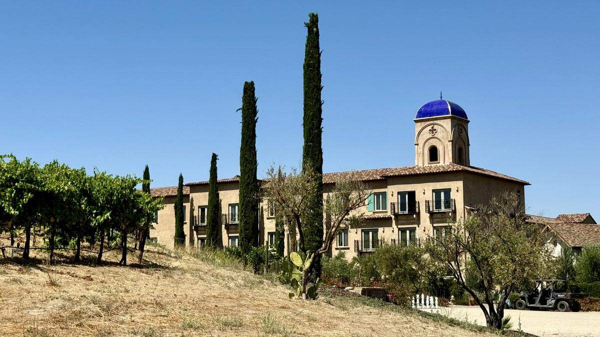 The rear of Allegretto Resort is seen in a view from a vineyard tour.