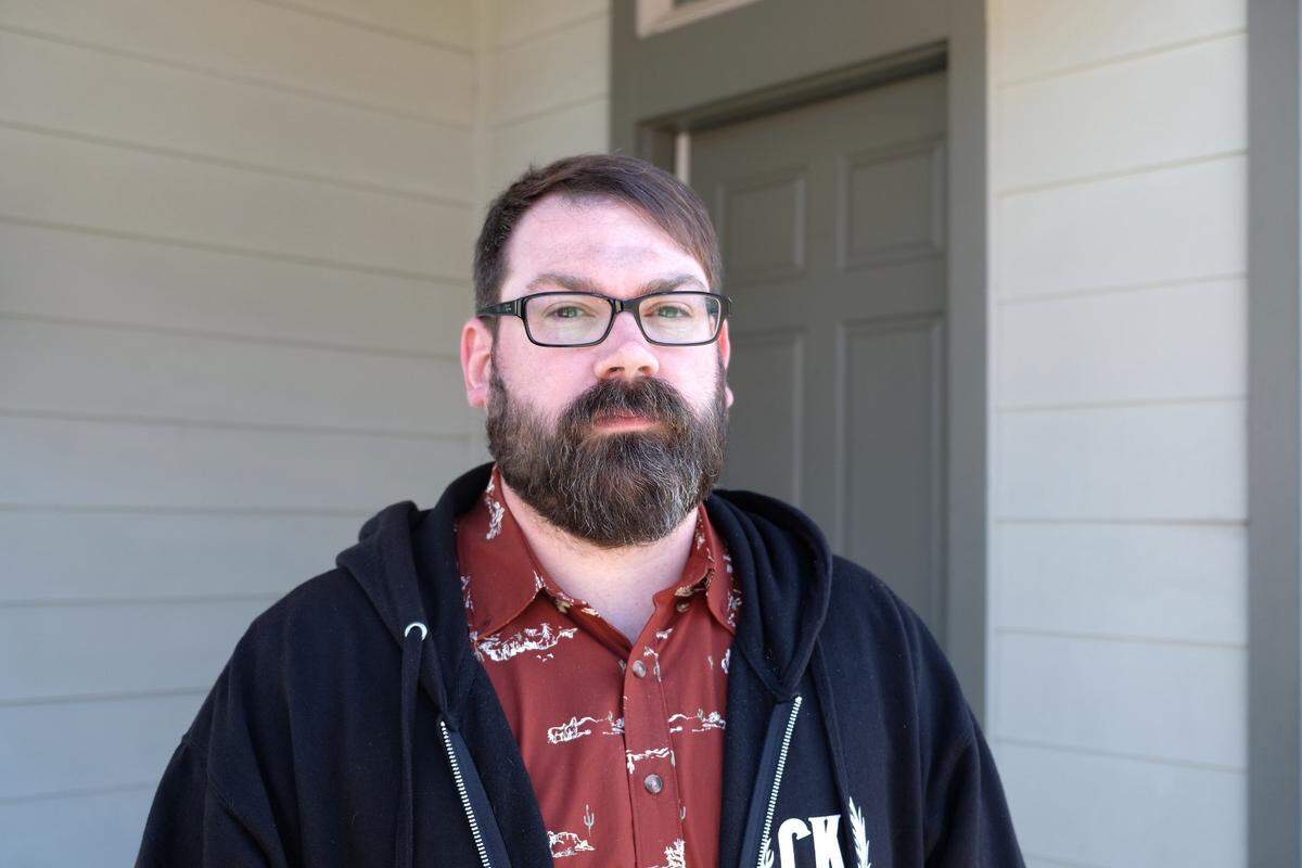 Chris Lambert, of the podcast “Your Own Backyard,” kept an eye on the search of the Branch Street home of Susan Flores on Friday, May 8, 2026, as authorities continued to serve a search warrant in the Kristin Smart investigation.