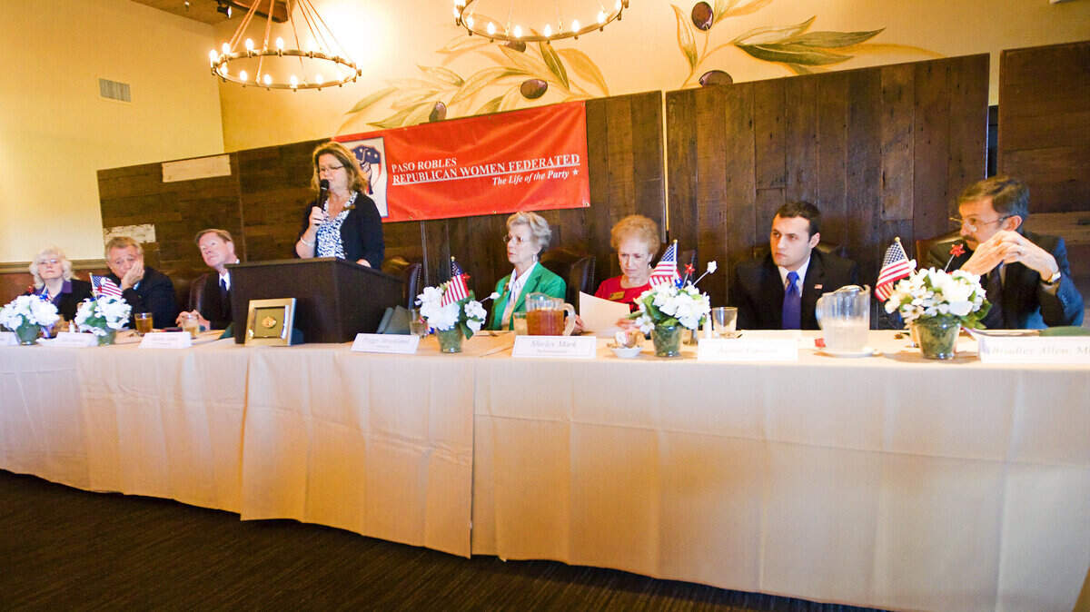 Paso Robles Republican Women Federated members Martha James, standing, Peggy Strickland, in green, and Shirley Mark lead a forum for congressional challengers Alexis Stewart, far left, Chris Mitchum, Dale Francisco, Bradley Allen, right, and Justin Fareed at the Paso Robles Golf Club.