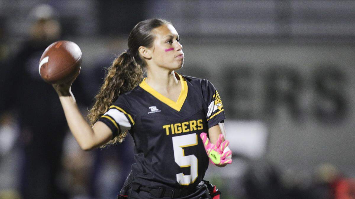 Leanna Saligan passes for the Tigers. San Luis Obispo beat Santa Maria 51-6 in a girl's flag football game seen here on Oct. 16, 2025.