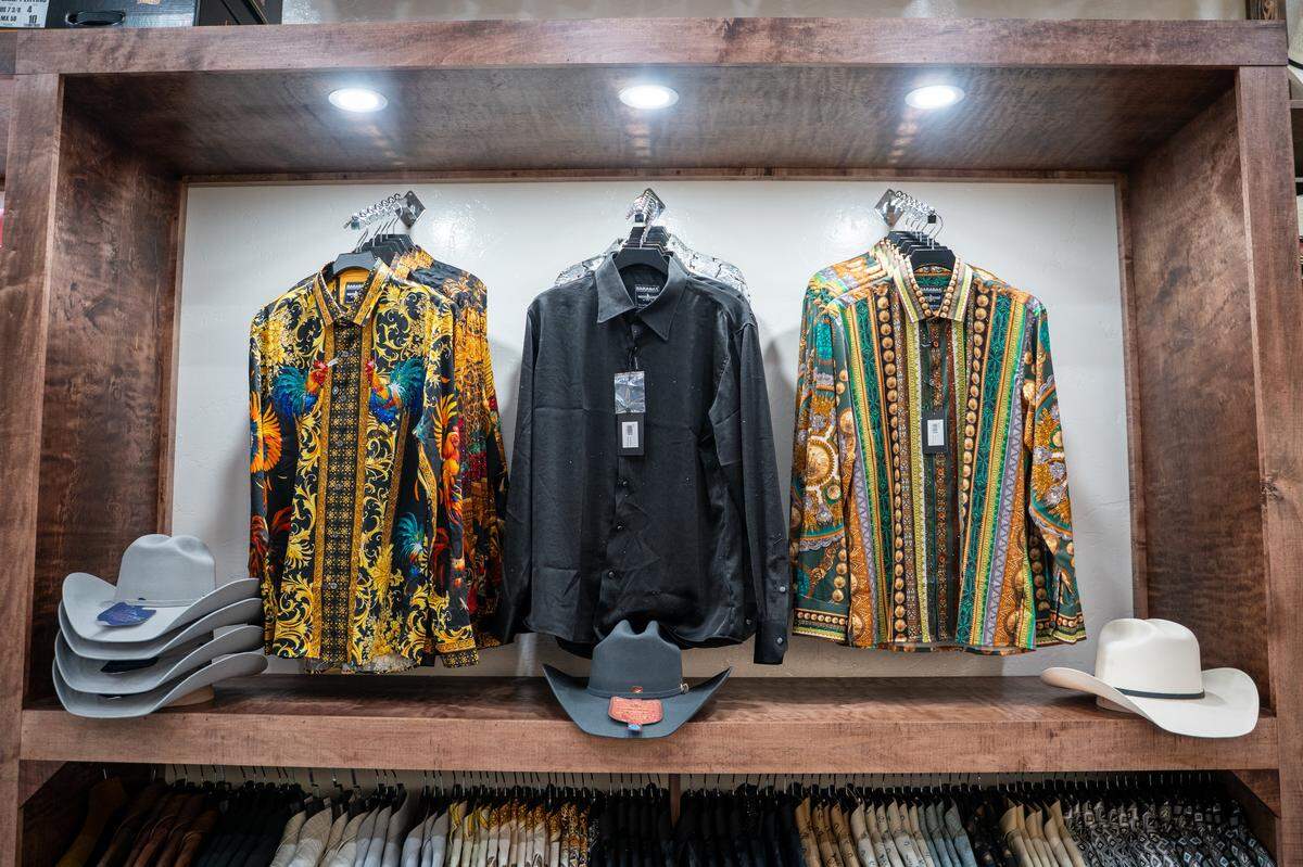 Shirts and hats sit on racks at Salinas Charreria Western Wear The interior of Salinas Charreria Western Wear, pictured here on Tuesday, Jan. 27, 2026. Salinas Charreria Western Wear opened its San Luis Obispo location Jan. 3 and has proved a hit already, drawing large crowds on opening day.