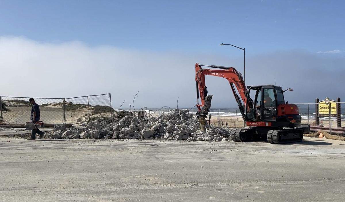 A concrete ramp is ripped up at the Grand Avenue entrance to Oceano Dunes State Vehicular Recreation Area.