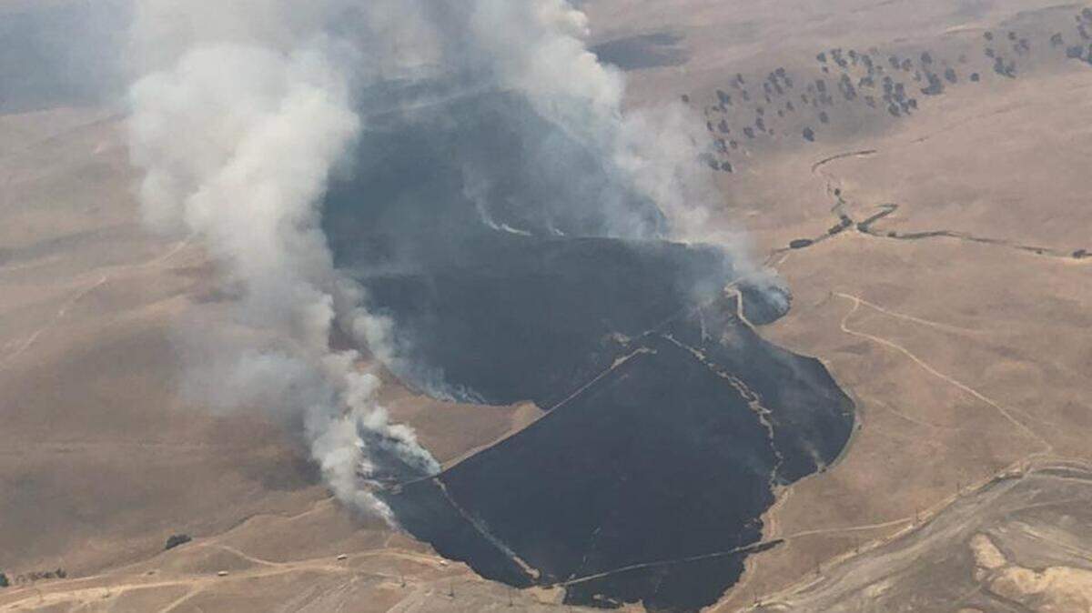 Cal Fire crews battle the Turkey Fire in southern Monterey County on Monday, August 6, 2018. The fire sent heavy smoke into northern San Luis Obispo County.