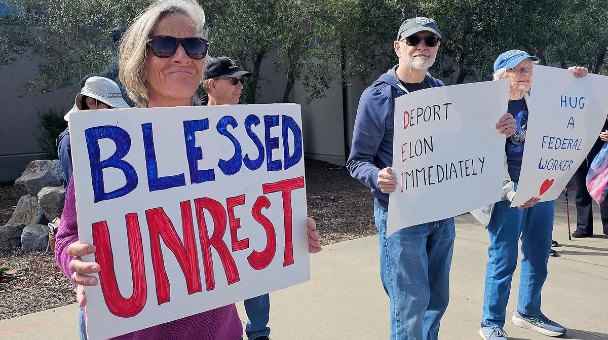 Hundreds of people gathered at each corner of the intersection at Los Osos Valley Road and South Bay Boulevard to protest the current administration on Saturday, Mar. 1, 2025.
