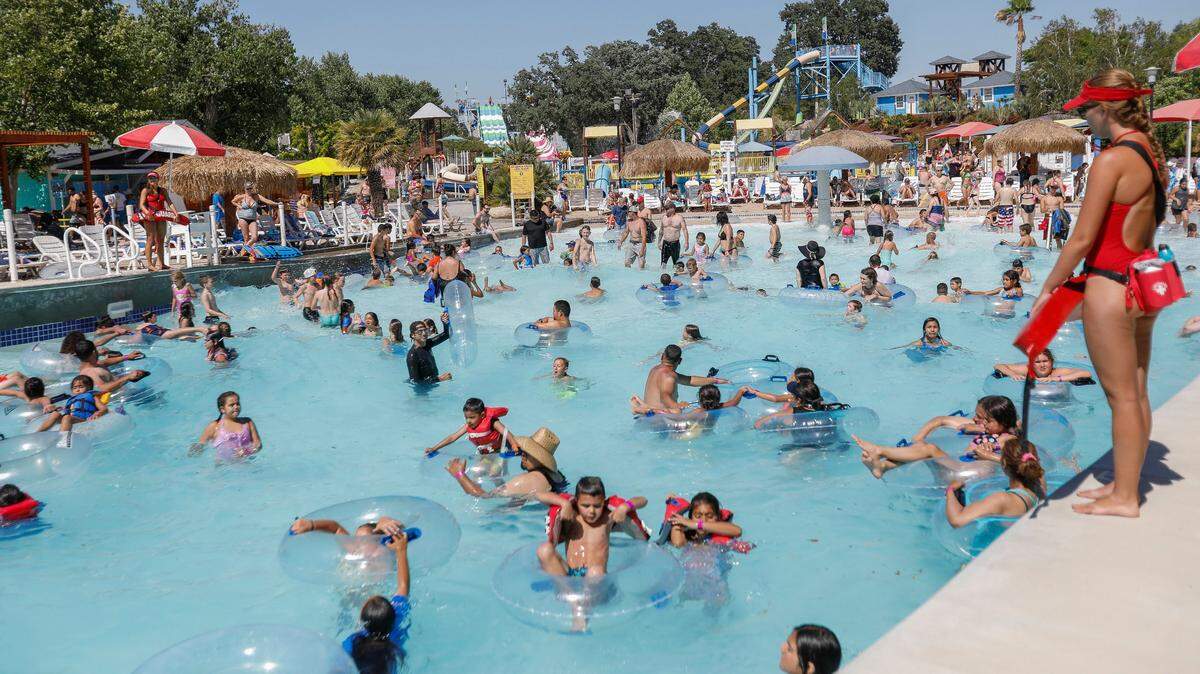 Families flock to The Ravine Water Park in Paso Robles in June 2018. The park will reopen in May 2021 after remaining closed for a year during the COVID-19 pandemic.