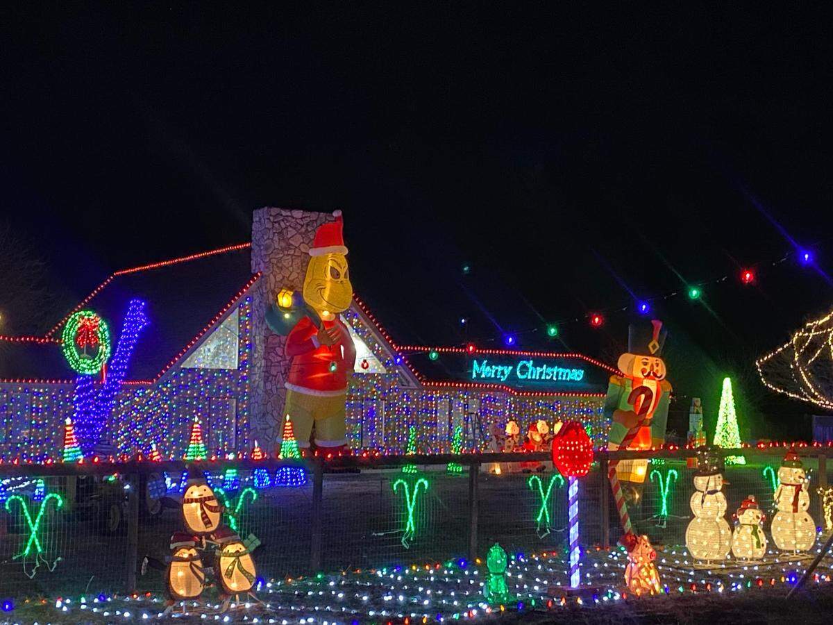 Andrew Bittle’s house at 4850 Tower Road in Paso Robles is covered in thousands of Christmas lights and a giant inflatable Grinch this holiday season.
