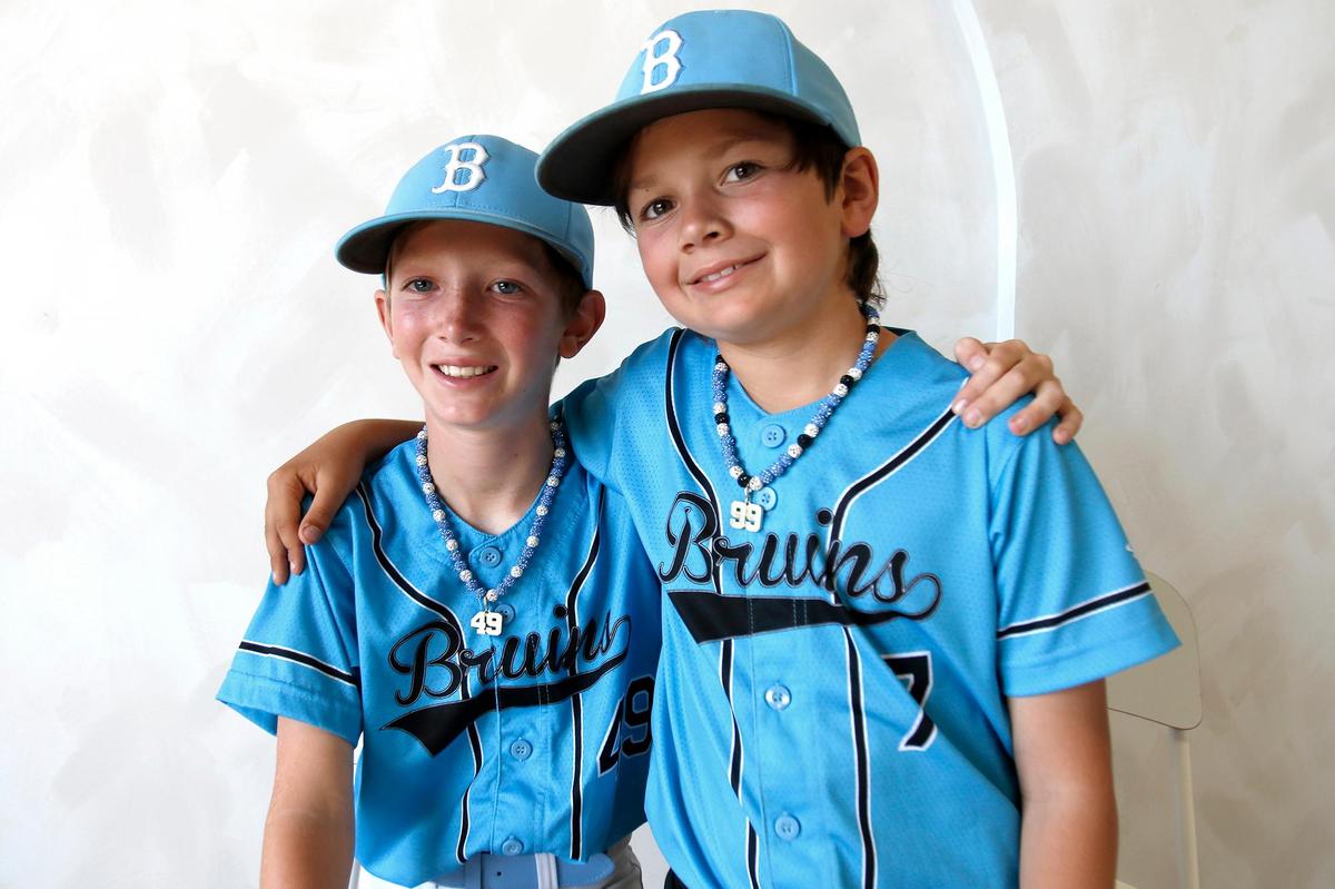 Jackson Judge, left, and Jackson Houser, fourth-graders at Teach Elementary School in San Luis Obispo, launched a necklace business called The Drip Bros as part of a school project.