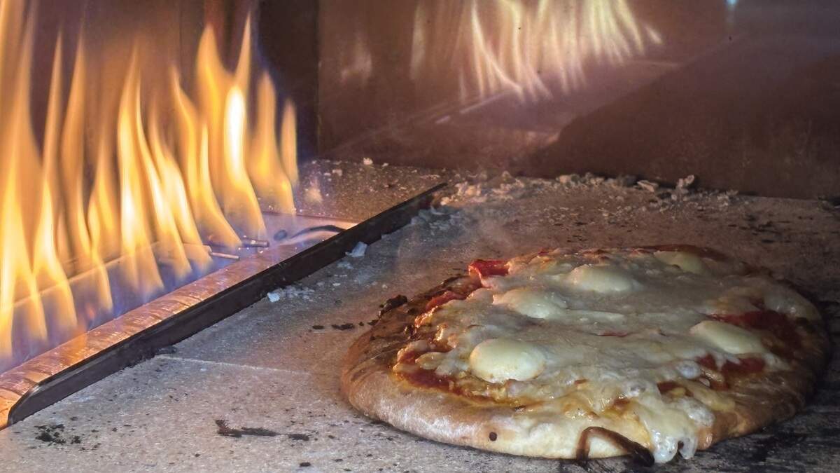Melo Mela Kitchen serves Italian-California cuisine, including a margharita flatbread, seen here on June 25, 2026.