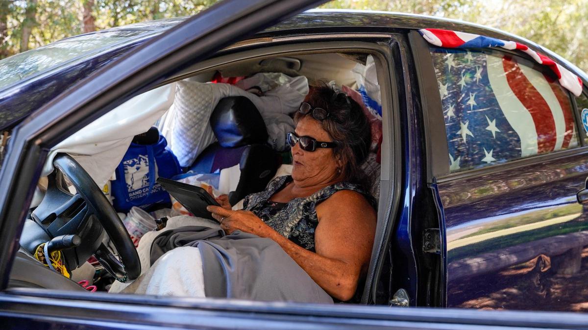 Tammy Pluneda, a former resident of San Luis Obispo County’s Oklahoma Avenue Safe Parking site, said she and other former residents have largely returned to vehicular homelessness around San Luis Obispo. She is pictured here on Aug. 9, 2024. Pluneda said her recreational vehicle containing personal items including her deceased son’s ashes has been impounded for several weeks for a parking violation.