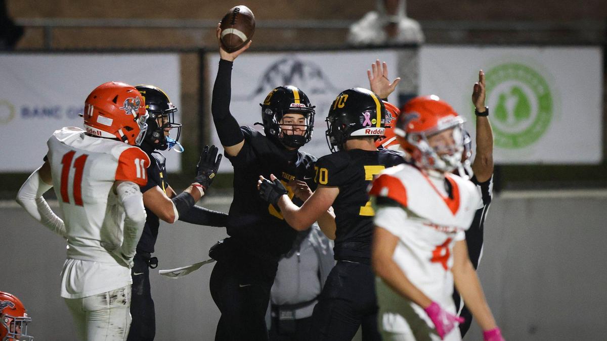 Jace Gomes ran for the Tigers’ first touchdown as San Luis Obispo beat Atascadero 35-0 to win the Sunset League title in a high school football game on Nov. 1, 2024.
