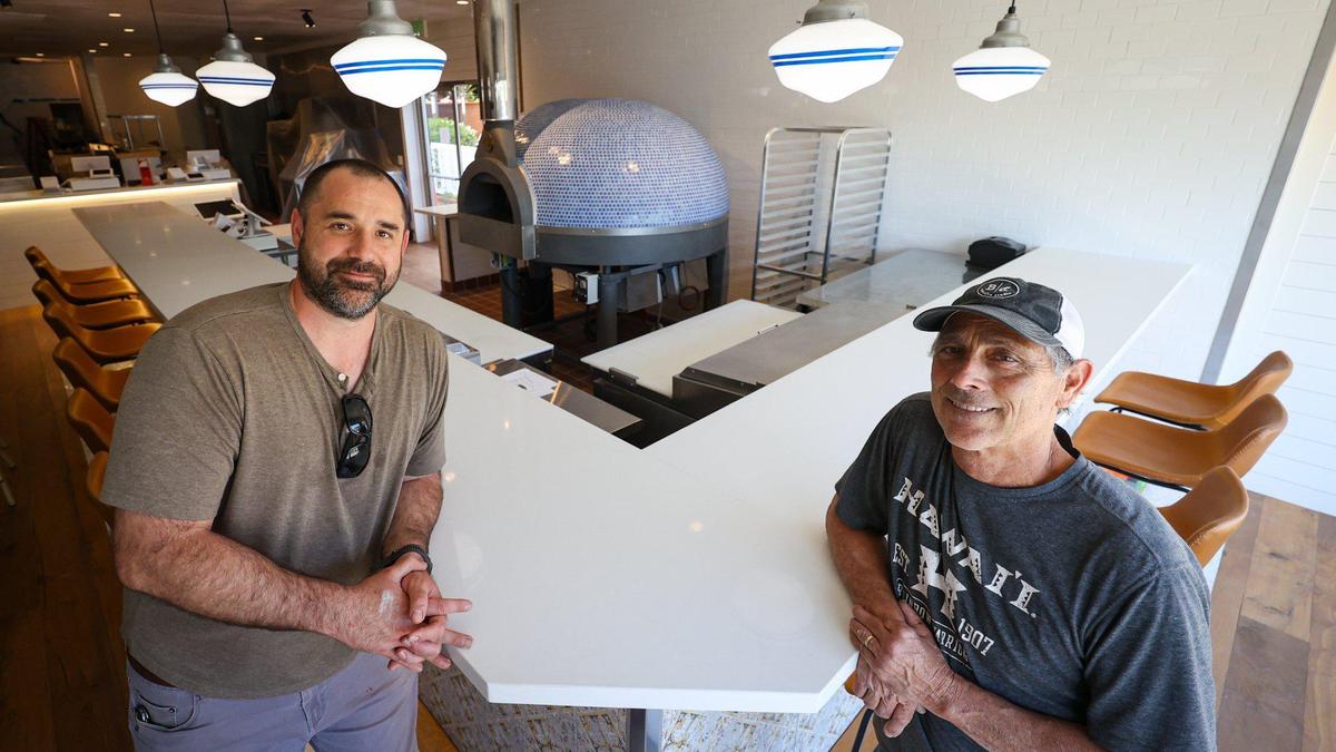 Left, Michael Goodloe, general manager and Bob Spallino co-owner are putting the finishing touches on the remodeled Branch Street Deli and Pizzeria. The shop closed nearly a month ago for a big remodel, which saw the deli switch from standard deli counter service to sit-down dining and more upscale options. May 8, 2023.