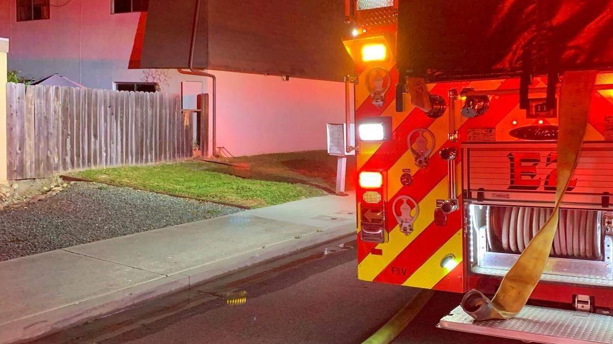 Firefighters respond to an apartment fire in Arroyo Grande on February 15, 2022.