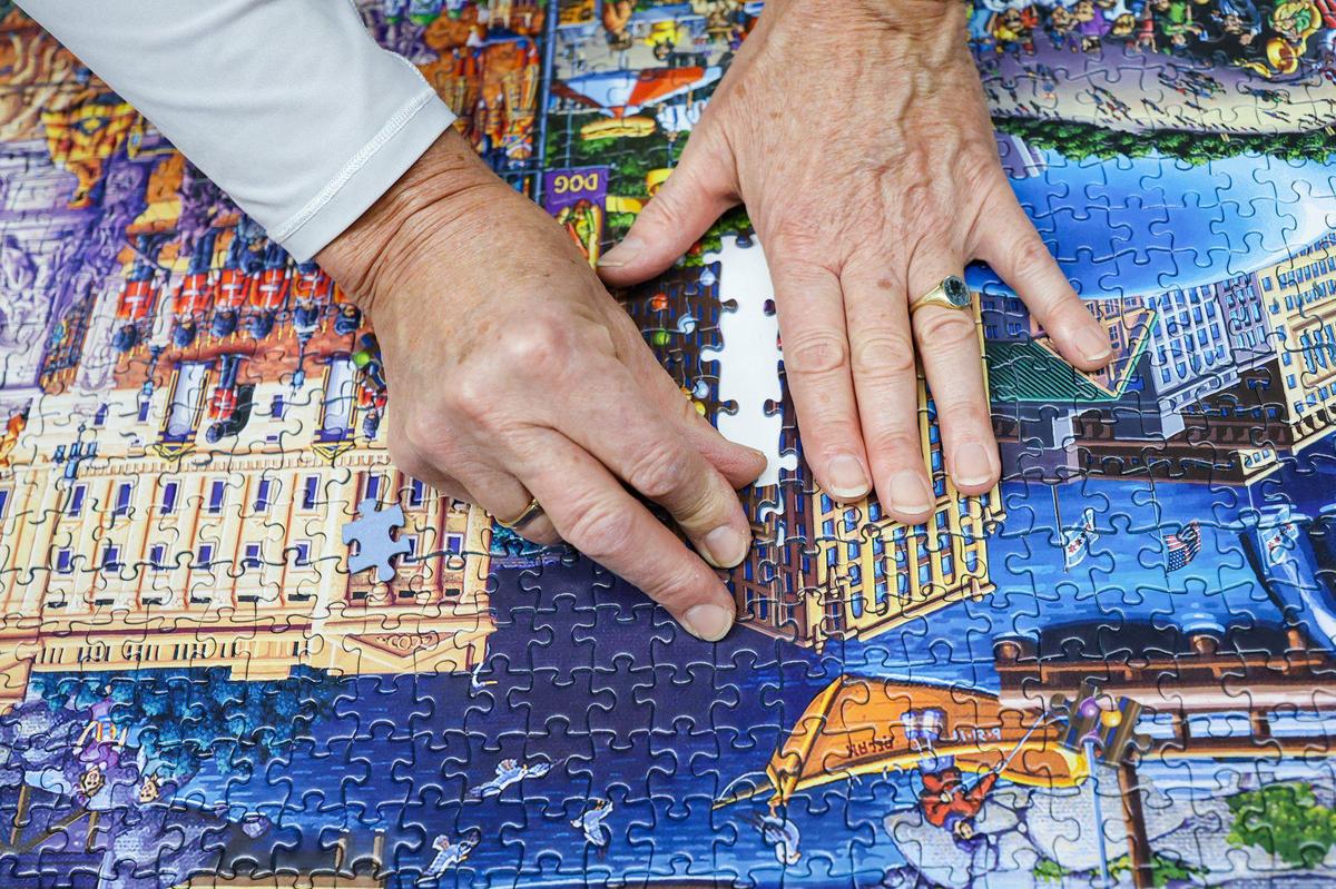 Dr. Minke WinklerPrins completed a 60,000 piece puzzle larger than a garage door. With help from friends 60 - 1,000 piece sections were assembled Dec. 29, 2022. She started the puzzle at the beginning of November when it was released.