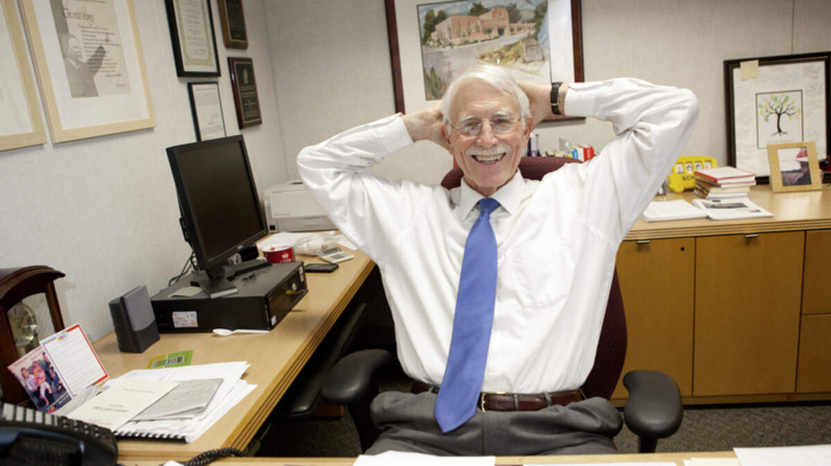 Julian Crocker, San Luis Obispo County superintendent of schools, will step down after 16 years as the county's top education administrator. Seated in his office and at his desk, Crocker says he'll spend more time dancing with his wife.