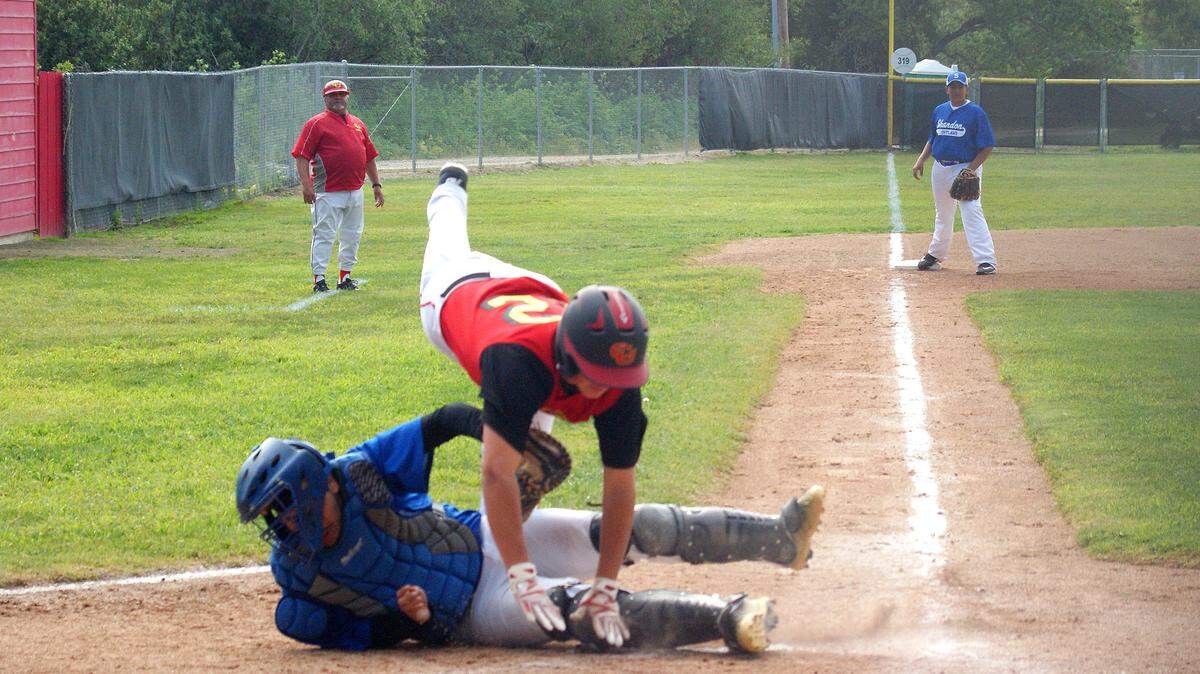 Coast Union sophomore Emany Plasencia is tagged out trying to score against Shandon on May 1. The Broncos won 12-2..