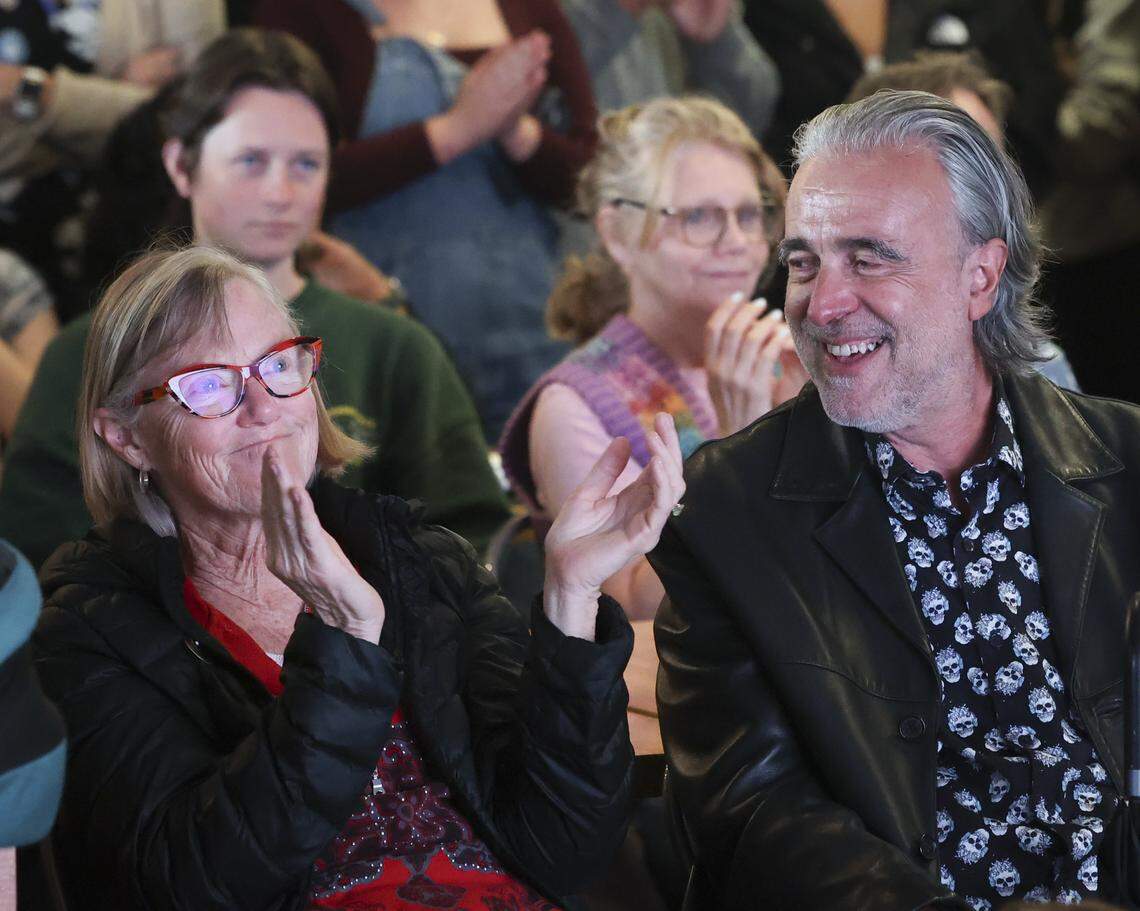 India D'Avignon, left, professsor emeritus with the music department, registered a range of emotions as she sat with Ignatios Vakalis, former chair of the Computer Science Department. An audience of about 300 witnessed the splashown of the Artimis II mission around the moon April 10, 2026 at Cal Poly's University Union.