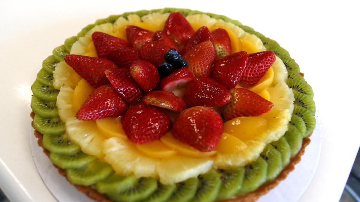 A strawberry, pineapple, apricot tart. La Parisienne in Morro Bay is a French bakery is serving up flaky pastries, iced cookies and hearty sandwiches, all at an affordable price for locals and tourists alike.