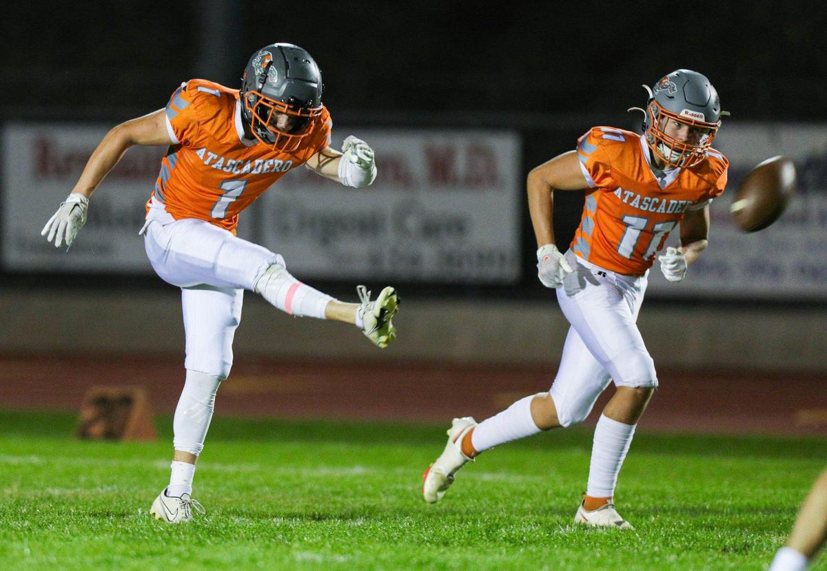 Skyler Silva kicks off followed by Tyler Bukamier. The Atascadero Greyhounds beat the Templeton Eagles 27-21. Atascadero high School hosted Templeton in Ocean League football on Oct. 7, 2022.