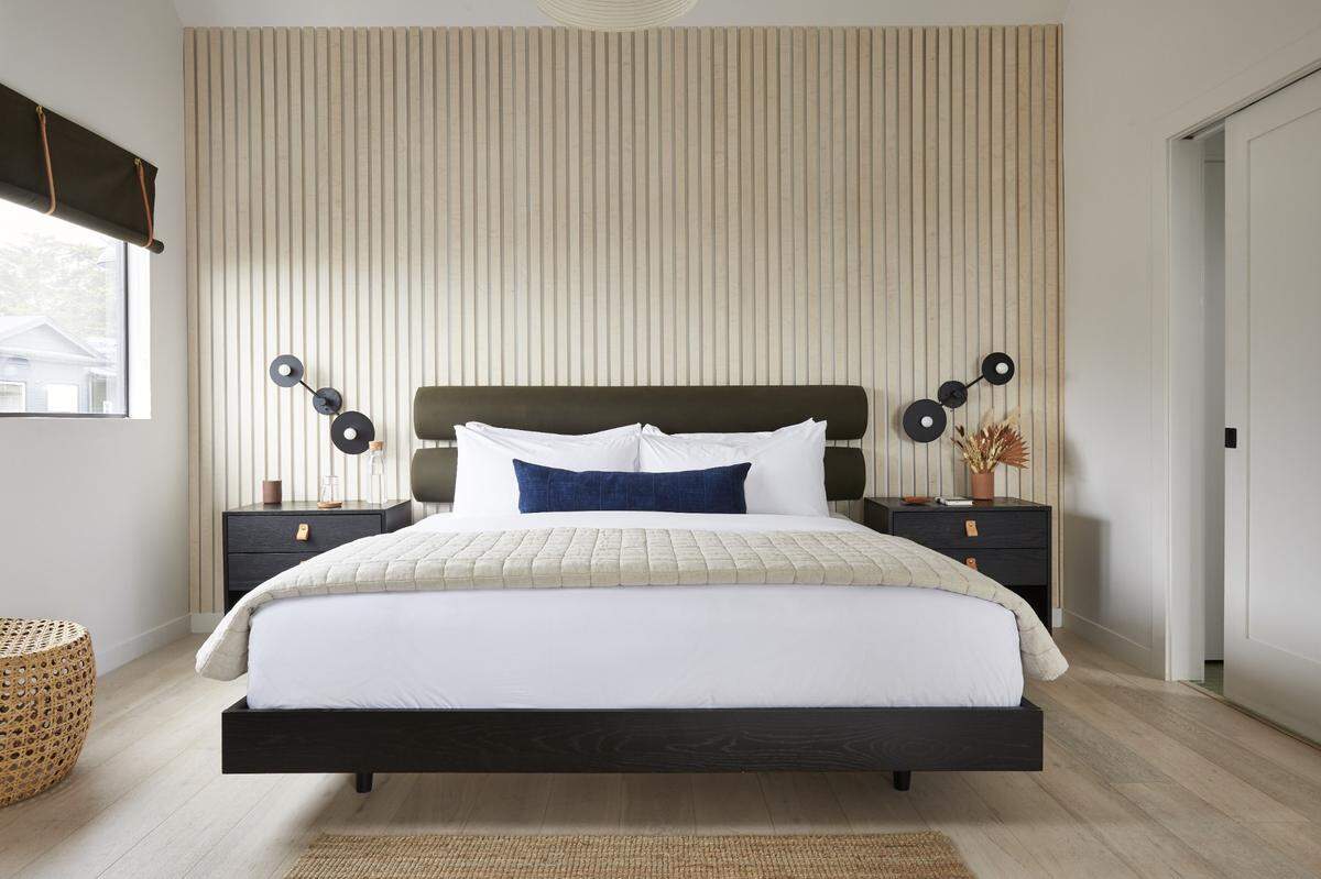 A room at White Water in Cambria features a king-sized bed and an ocean view. The hotel was featured in Conde Nast Traveler’s 2021 Hot List.