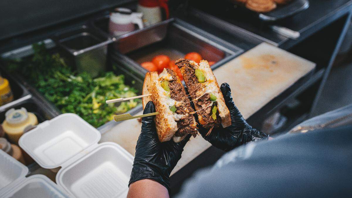 While visiting Brooks Burgers, Guy Fieri tried the Big Sheesh sandwich, pictured above, which is filled with half a pound of tender braised beef, pepper jack cheese, peppers and a cilantro aioli on fresh sourdough.