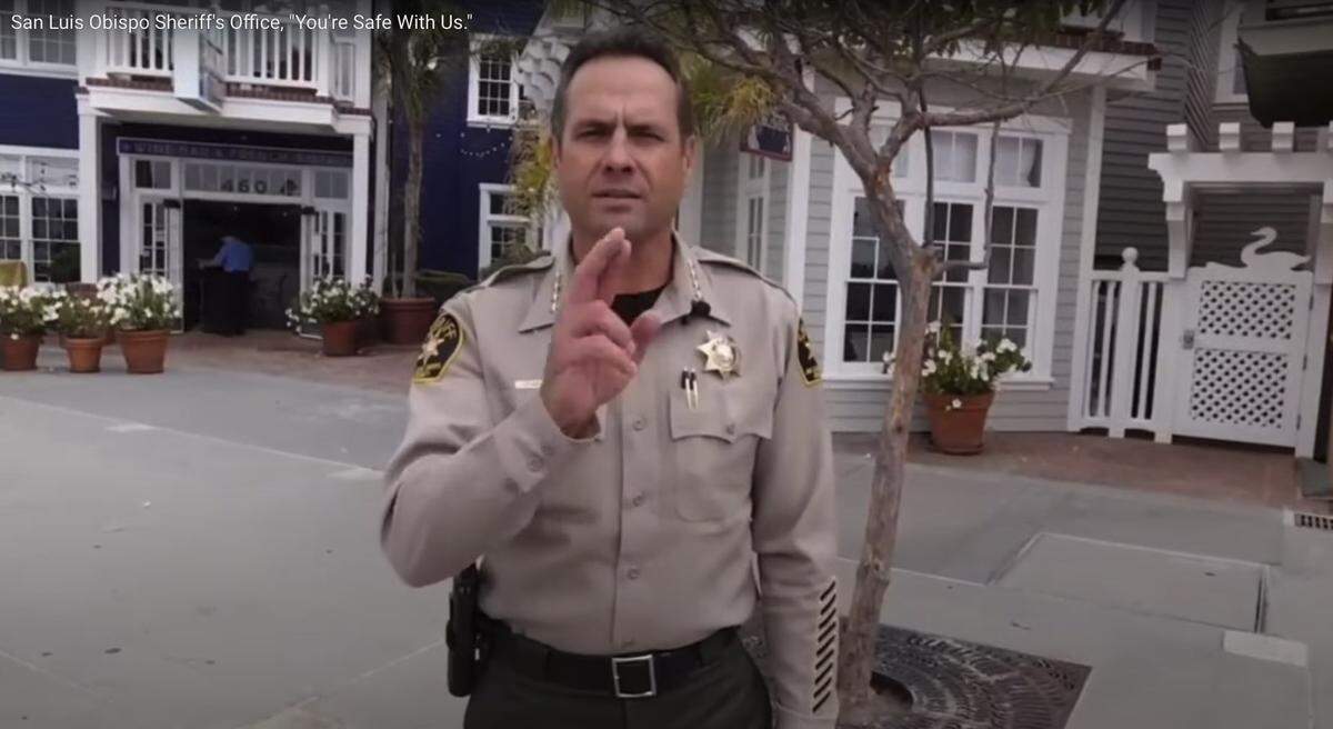 In the video, Sheriff Ian Parkinson says, “I’m white and I’m American and you are safe with us,” before repeating the message in sign language.