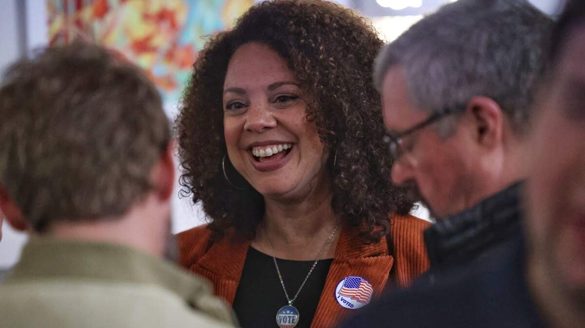 Incumbent San Luis Obispo Mayor Erica Stewart talks with supporters at an election night party at Big Sky restaurant in San Luis Obispo on Tuesday, Nov. 8, 2022.