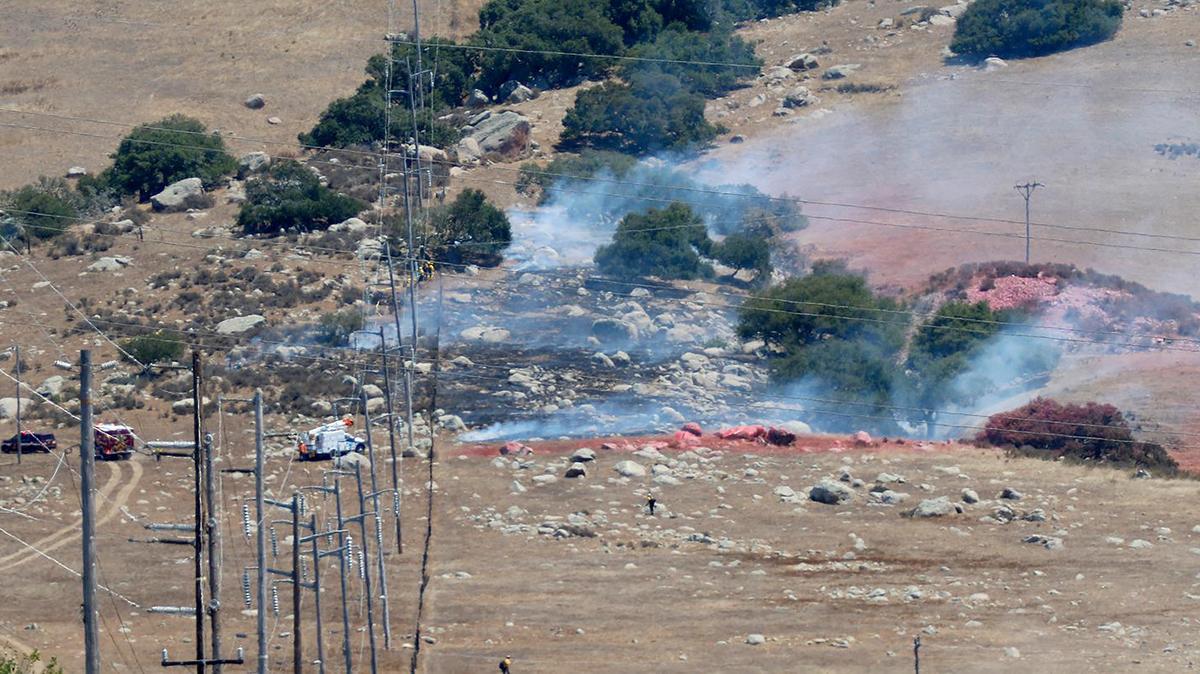 A vegetation fire burns on the hillside about half-mile from O’Connor Way in San Luis Obispo on Aug. 3, 2022.