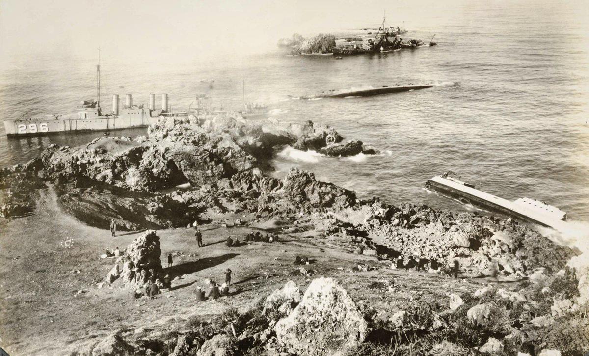 Five of the seven U.S. Navy destroyers that ran aground at Honda Point on Sept. 8, 1923, can be seen in this photo. At left is the USS Chauncey, marked with the number 296. At center is USS Young, lying flat on starboard side. At right, broken in two, is the USS Delphy, the flagship that led the ill-fated journey. In the background on the rocks are the USS Woodbury, and further out, the USS Fuller. They wrecked north of Point Conception in heavy fog. It was the worst peace-time Navy disaster with the death of 23 seamen and the loss of the destroyers. Out of frame to the right were the USS S.P. Lee and USS Nicholas.