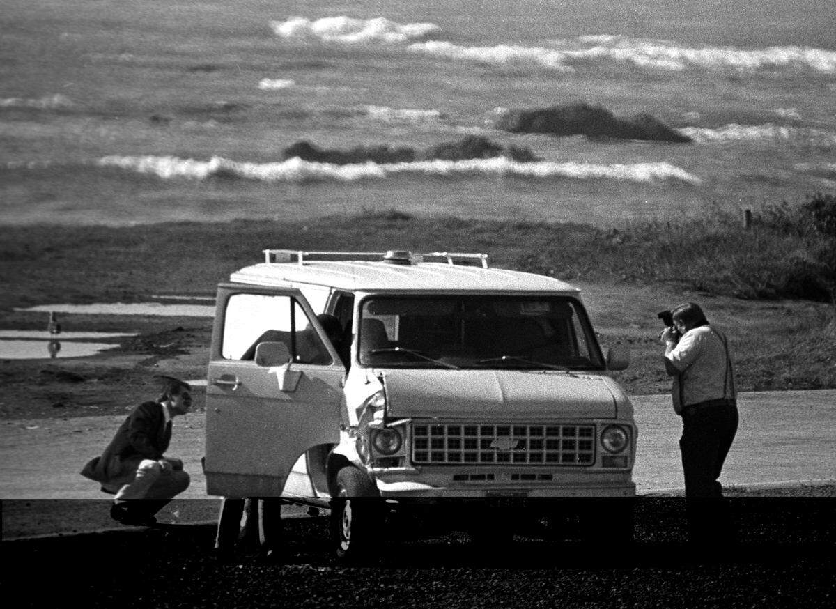 Investigators document a van in which a woman’s body was found in a pullout on Highway 1, about three miles north of Hearst Castle, on Nov. 15, 1983. Dorothy Alice “Toby” Tate was found shot to death in the vehicle.