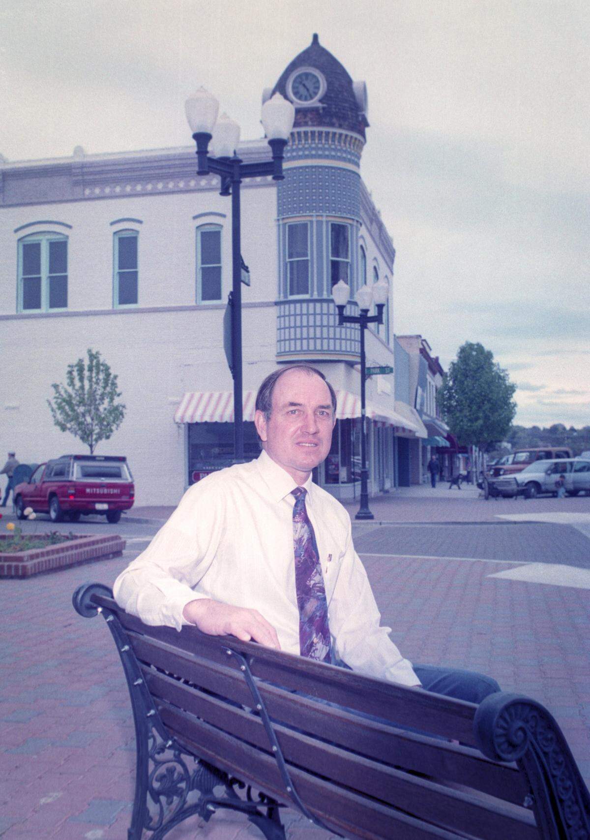 Nick Sherwin, president of Main Street board and owner of Pan Jewelers in Paso Robles seen here March 24, 1994. The acorn building in background was destroyed in the San Simeon Earthquake.