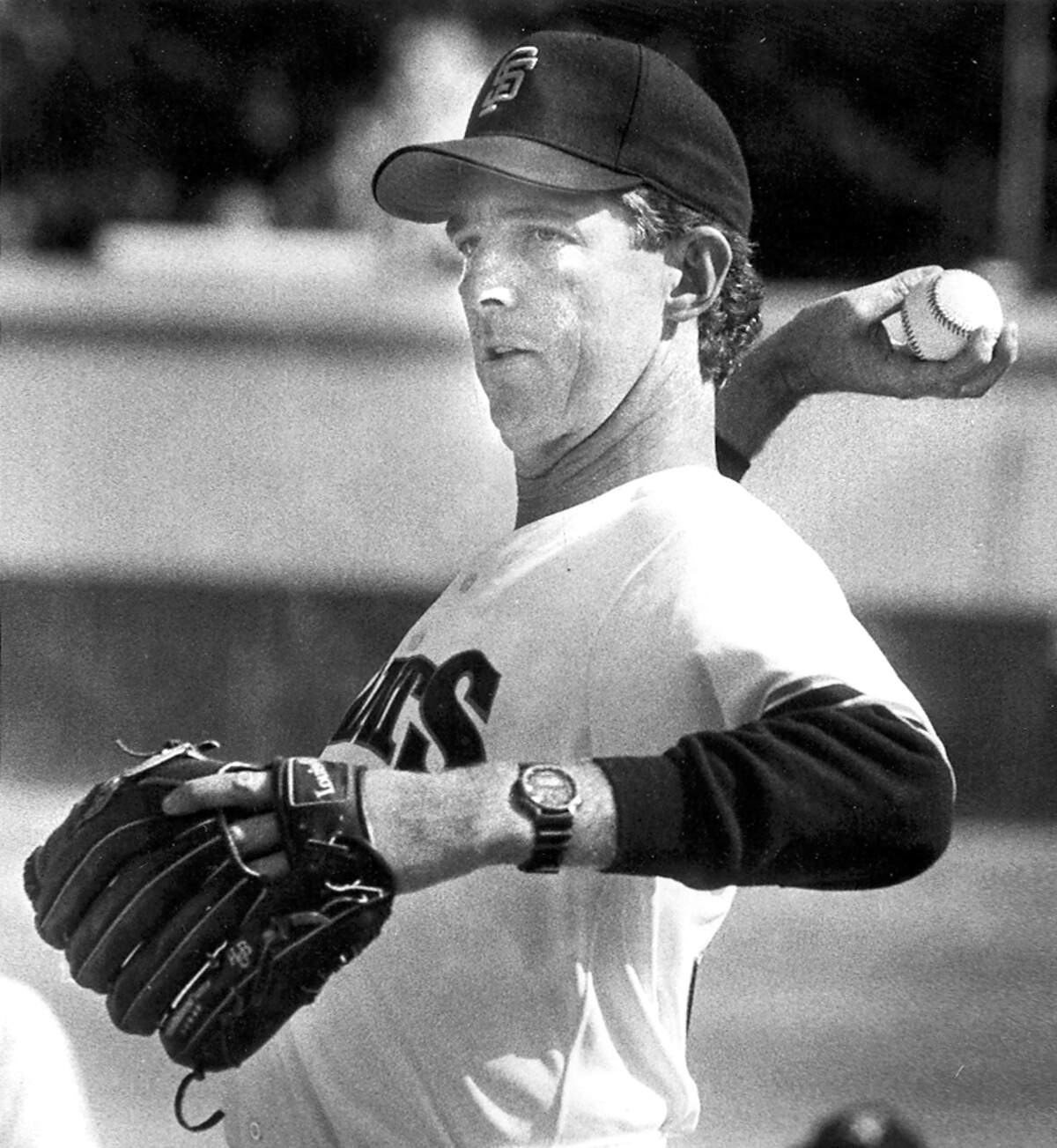 Mike Krukow demonstrates proper pitching form at a clinic for youngsters at Sinsheimer Stadium in San Luis Obispo on April 21, 1989.
