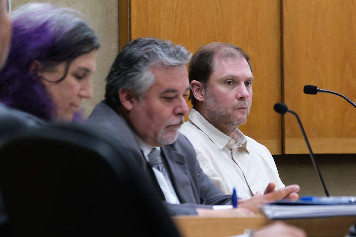 Charles Ammons, right, sits with his attorneys Mario Tafur, center, and Christina DiEdoardo during his jury trial in San Luis Obispo Superior Court on Sept. 13, 2024. Ammons is accused of attempting to murder a Pismo Beach police officer April 15, 2022.
