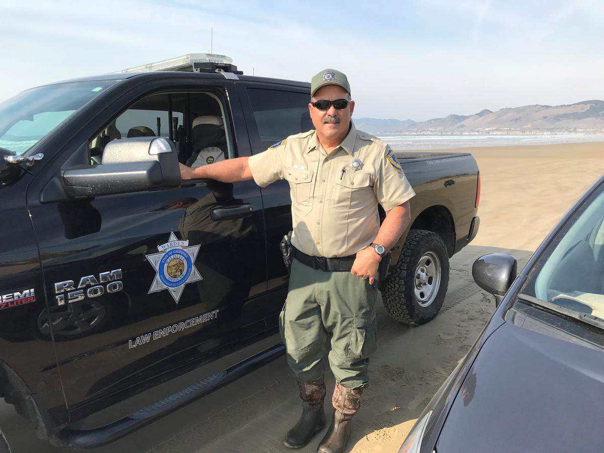 Fish and Wildlife Lt. Todd Tognazzini patrols Pismo Beach to look out for illegal clamming.