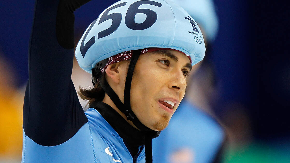 Apolo Anton Ohno waves to the crowd after skating in the men's 5,000-meter relay short track finals. The U.S. finished in 3rd place to win a bronze medal. (Harry E. Walker/MCT)