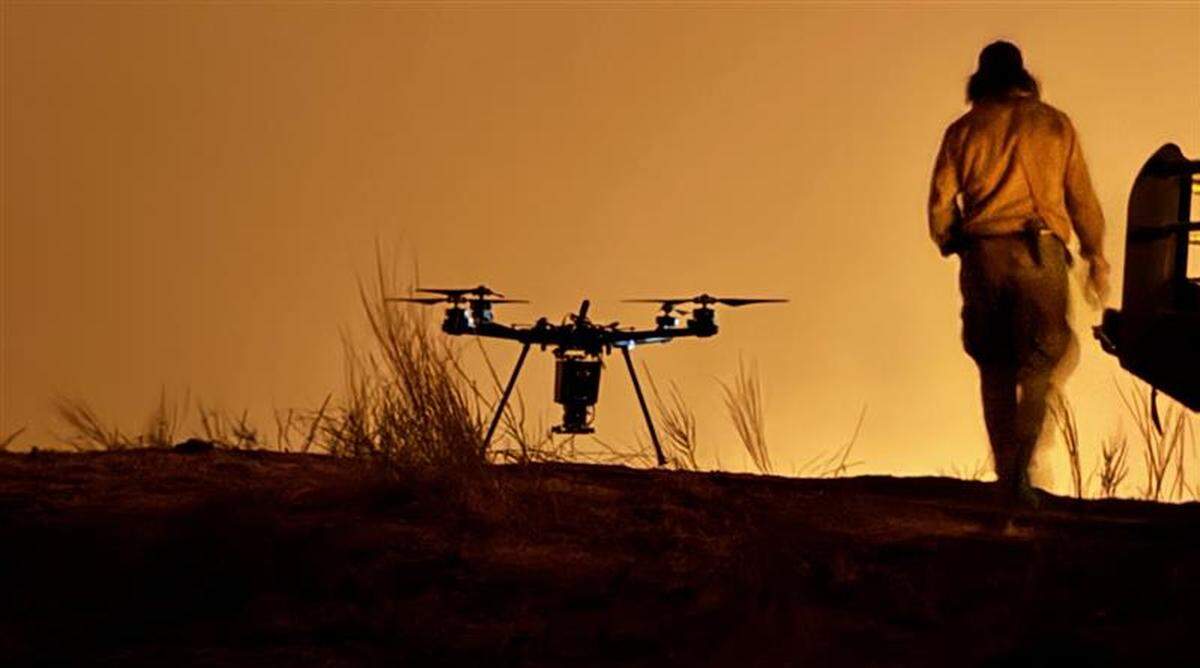Firefighters deploy a drone while battling the Gifford Fire overnight on Tuesday, Aug. 12, 2025.