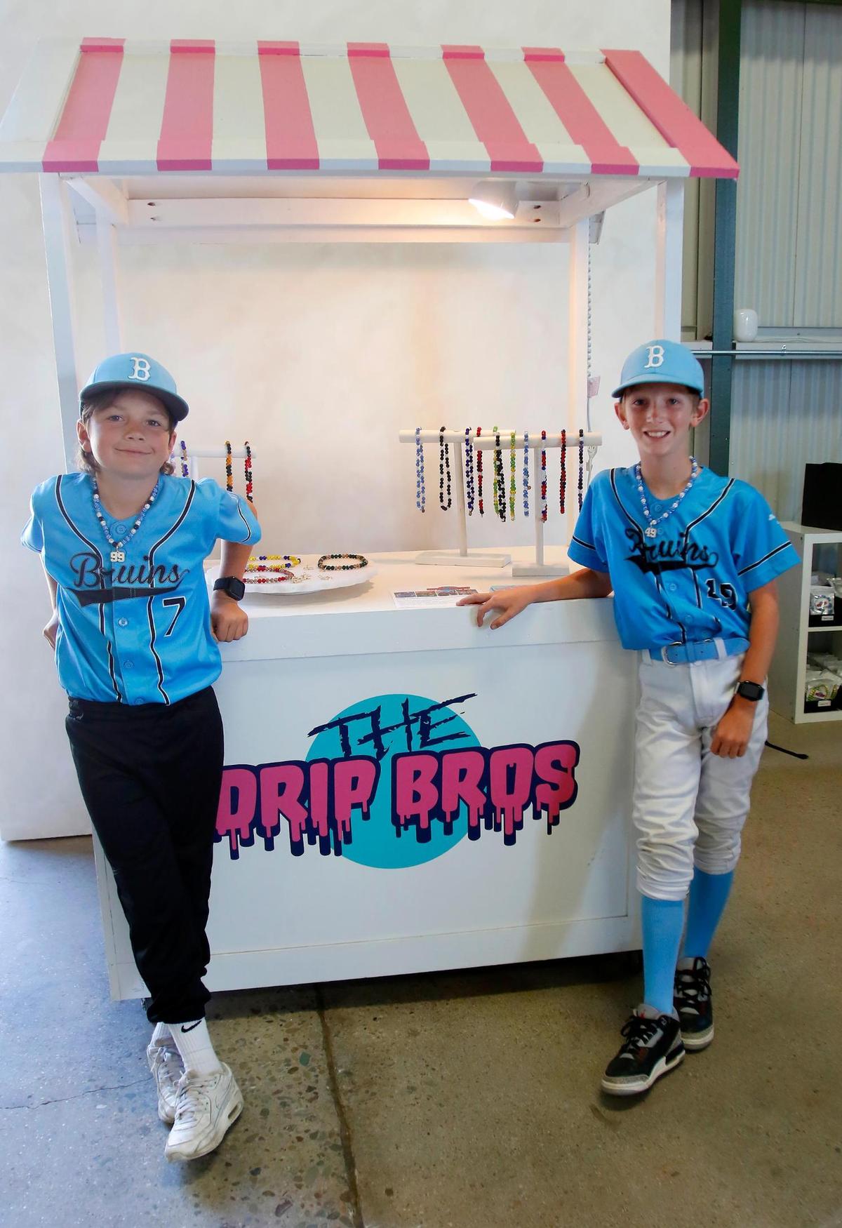 Jackson Judge, left, and Jackson Houser, fourth-graders at Teach Elementary School in San Luis Obispo, launched a necklace business called The Drip Bros as part of a school project.