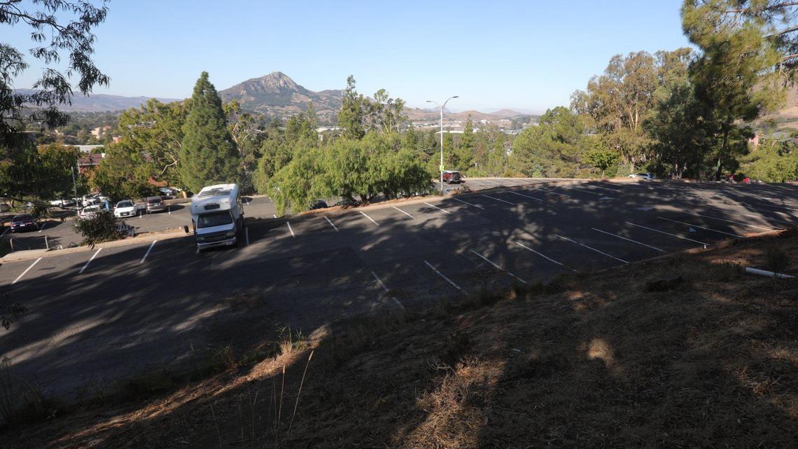 The parking lots above Cal Poly’s South Mountain dorms, known as the “Red Bricks,” will be the site of a new housing community that will be home to about 3,000 students.