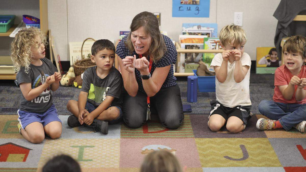 Teacher Fiona Lloyd-Moffett leads her transitional kindergarten students in play-based lessons that teach academic and social skills tailored to their age. This rendition of “Itsy Bitsy Spider” involved the Hawthorne Elementary School students in a kinetic repeating of the story on Sept. 18, 2025.