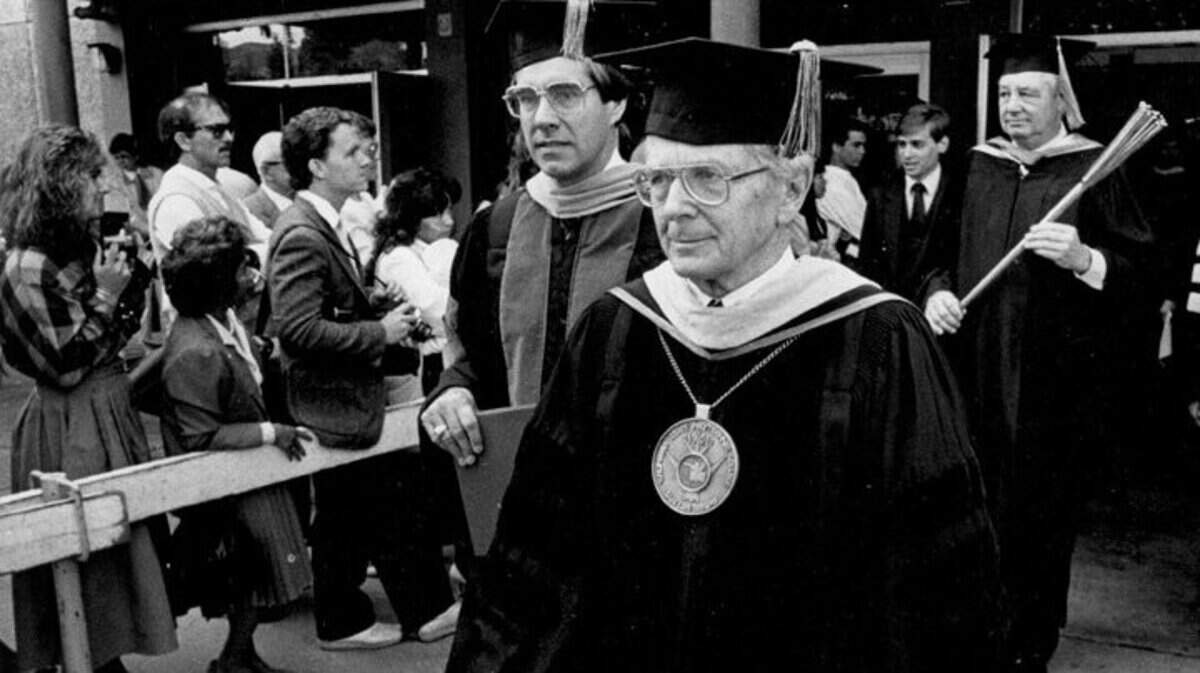 Warren Baker Cal Poly president and , and former president Robert E. Kennedy at a winter Cal Poly commencement ceremony. 12-15-1986 ©Telegram-Tribune 
