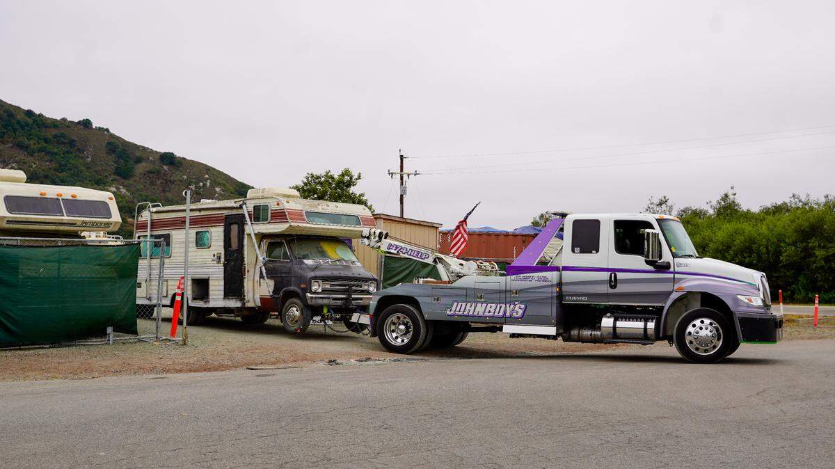A tow truck removes an Oklahoma Avenue Safe Parking Site resident’s camper from the program site Sept. 15. A total of six residents were evicted for alleged incidents and threats of violence on the site.