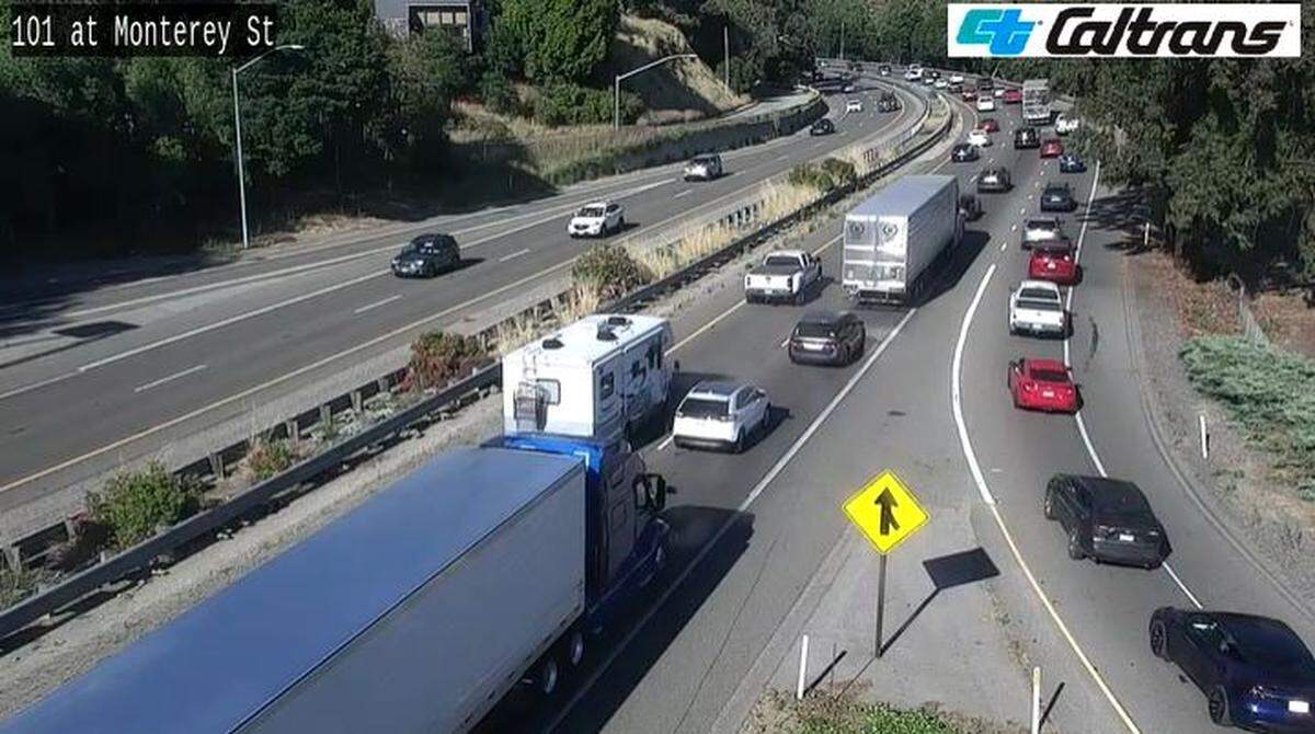 An overturned bus at the base of the Grade on Highway 101 snarled traffic through San Luis Obispo on Thursday evening.