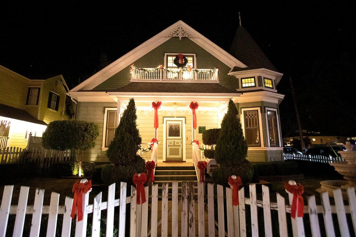The Vine Street Victorian Showcase held a drive-through once again on Saturday, Dec. 11, 2021. Santa and Mrs. Claus drove up and down Vine Street in the 35th rendition of the popular event. Ebenezer Scrooge drove by in a red convertible grumbling all the while.