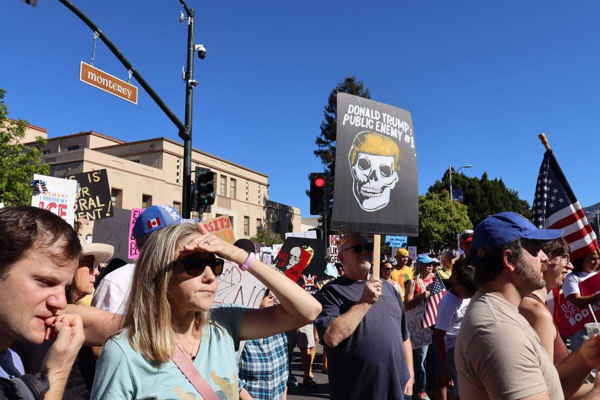 Thousands of people attended the No Kings rally in downtown San Luis Obispo to protest the Trump administration and support Prop. 50 on Oct. 18, 2025.