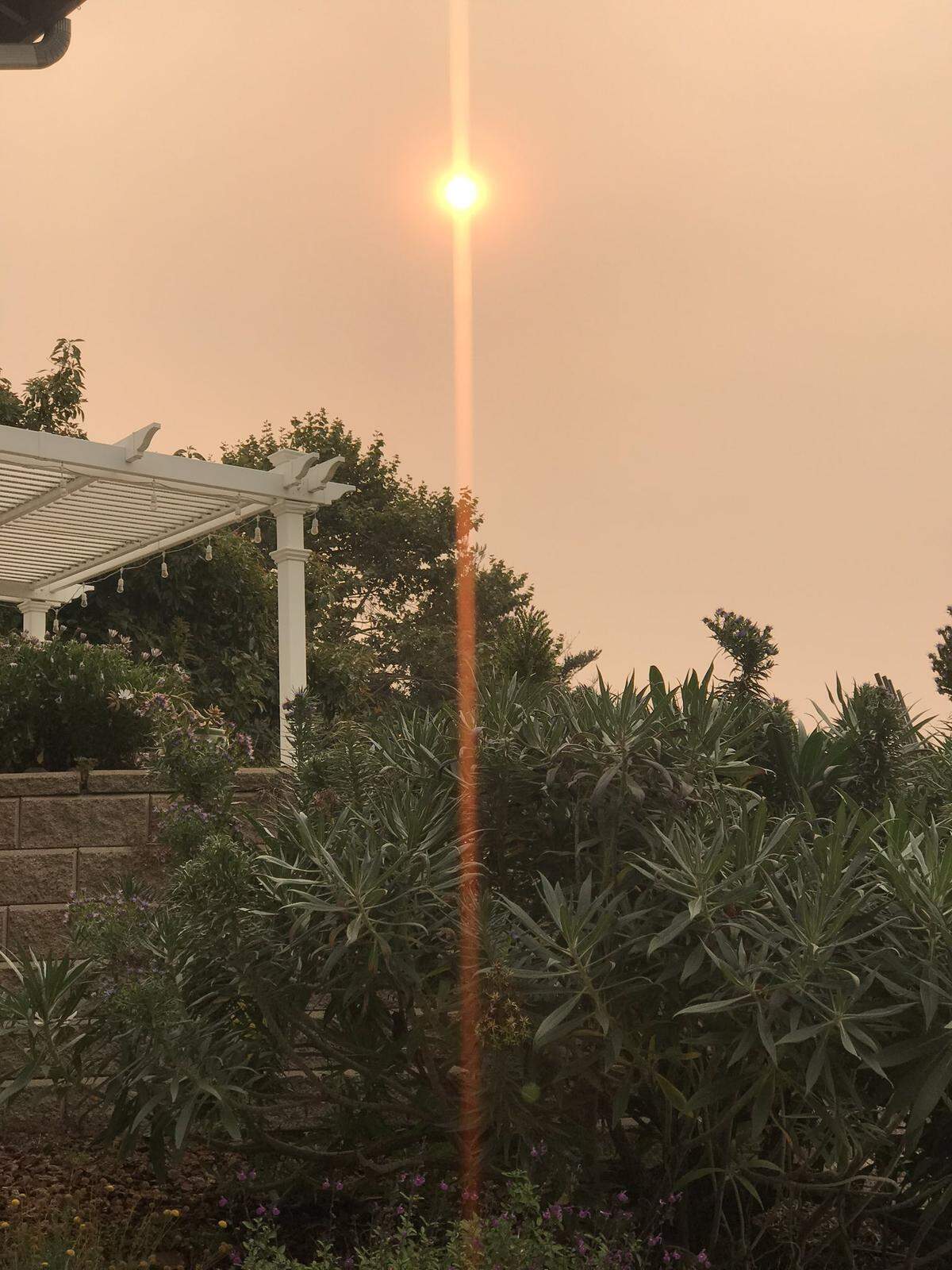 A peach-tinged sky in Arroyo Grande on the morning of Thursday, Aug. 20, 2020.