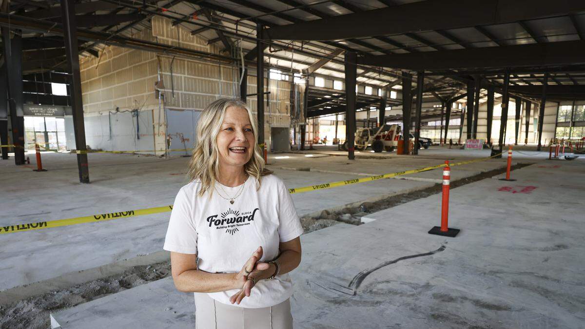 Susie Theule, founder and head of school of San Luis Obispo Classical Academy, leads a tour. The school is renovating a building on Broad Street to house its daycare, preschool and K-8 programs. Seen here on Oct. 28, 2025.