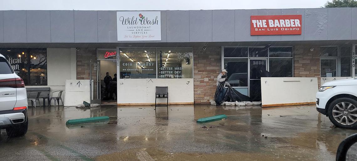 Business along South Higuera Street at South Street in San Luis Obispo were hit with flood water, mud and debris.