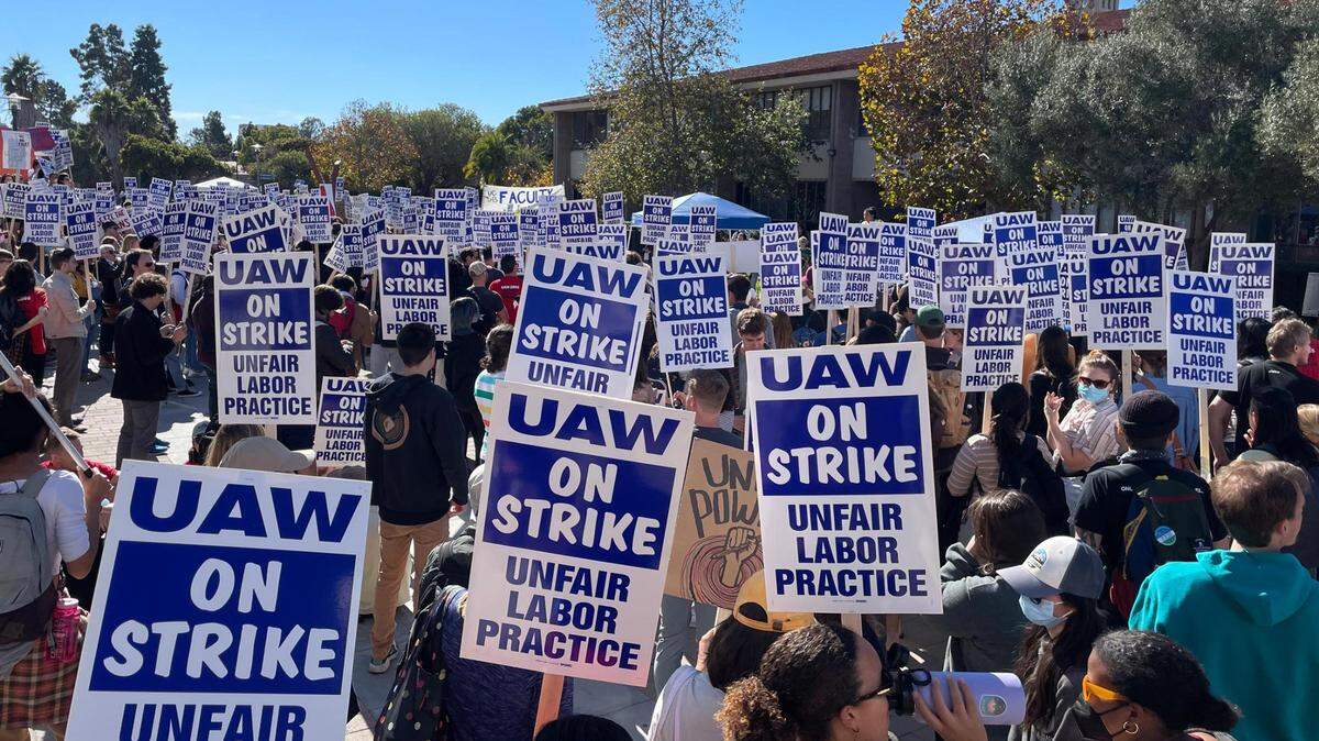 Hundreds of workers on strike gather outside Davidson Library.at UC Santa Barbara on Monday, Nov. 14, 2022.  