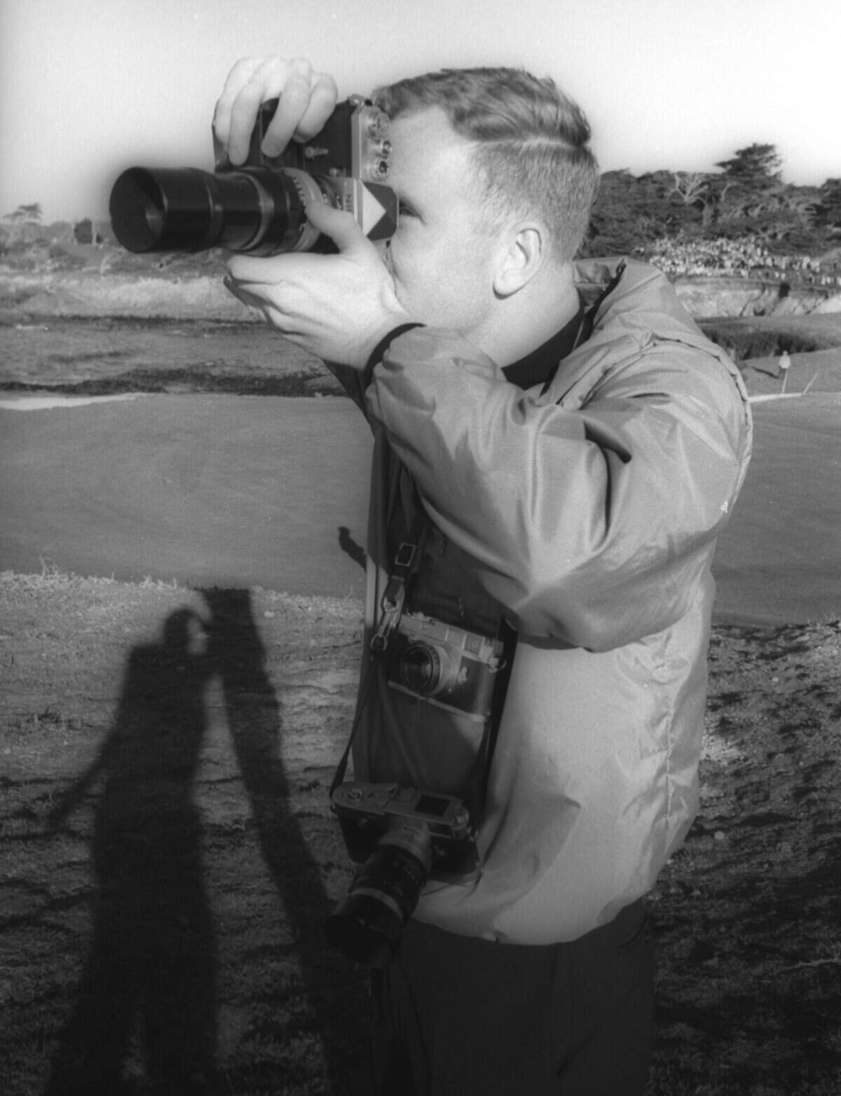 Jim Vestal, Telegram-Tribune photographer when Bing and Kathy Crosby hosted the 25th annual Crosby Clambake or Crosby National Pro-am in Pebble Beach, California published Jan. 22, 1966. It looks like he let another photographer take his picture with one of his cameras.